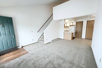Vaulted ceilings (with ceiling fans) in loft apartment homes